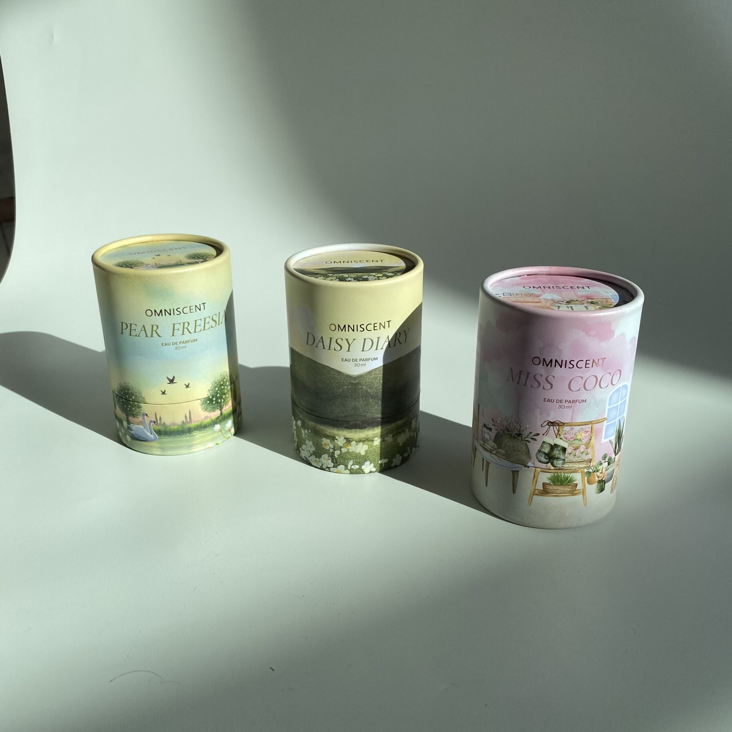 Custom paper tube packaging for a fragrance brand, manufactured by Sicetak